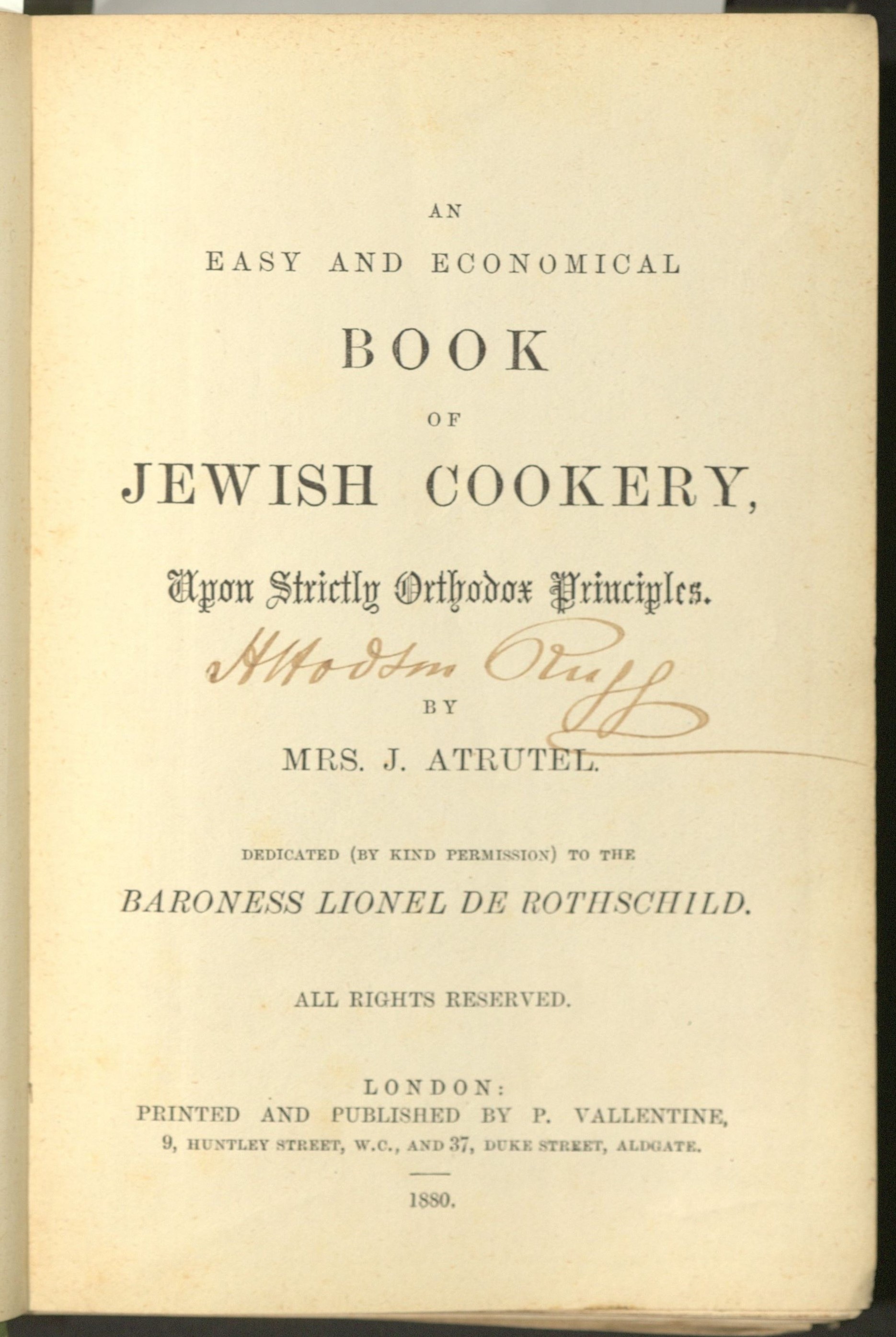 Title page of book using several different type faces. in black on slightly browned paper. An indecipherable signature (probably not the author) in faded brown ink appears under the title.