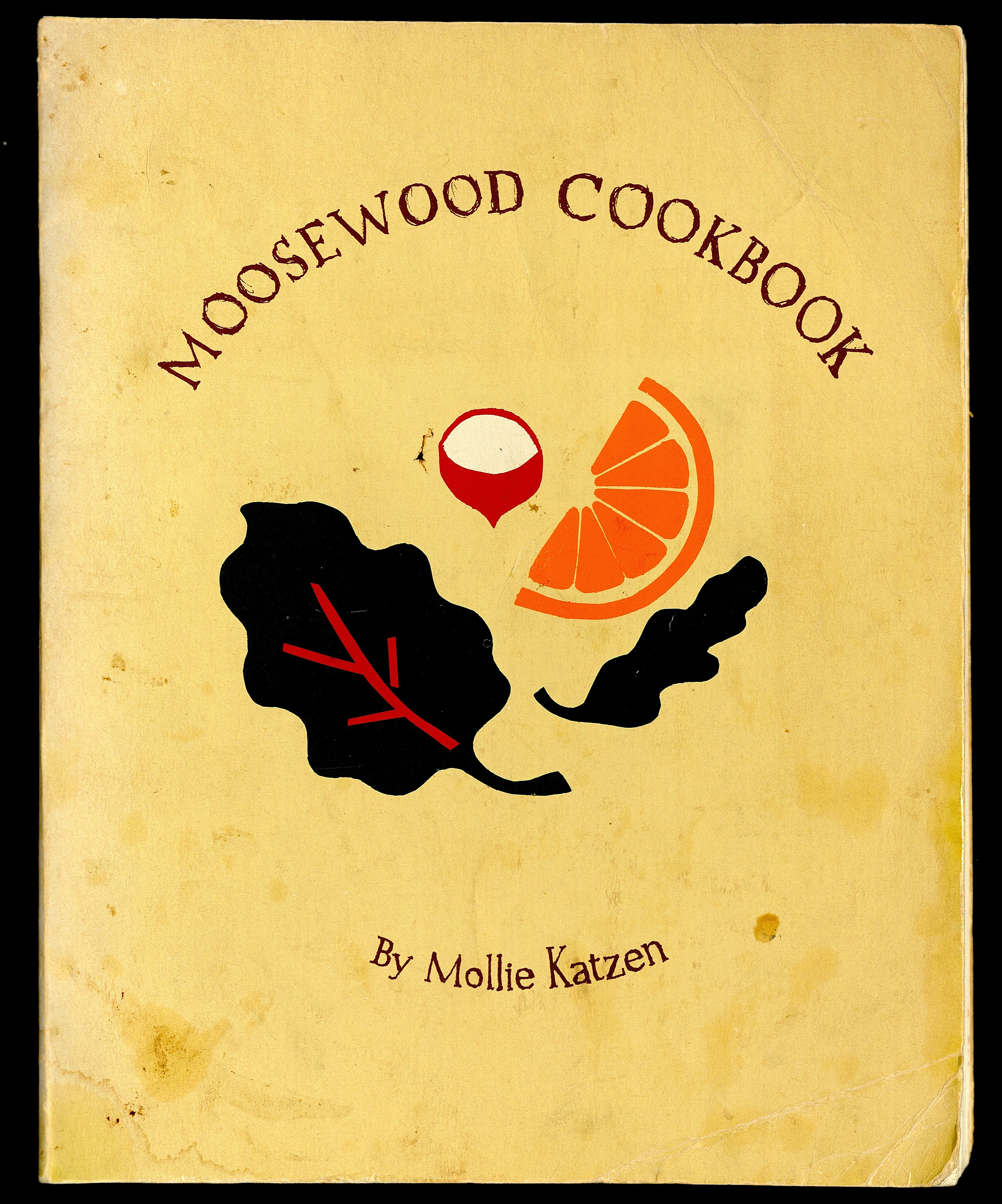 Cover of The Moosewood Cookbook with an illustration of an orange slice, a radish, and a chard leaf. 