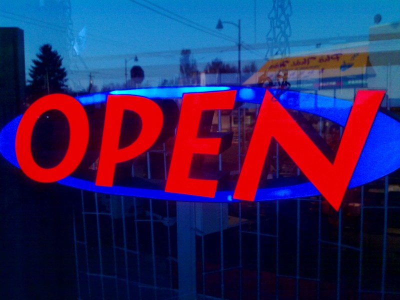 A open sign in a shop window 