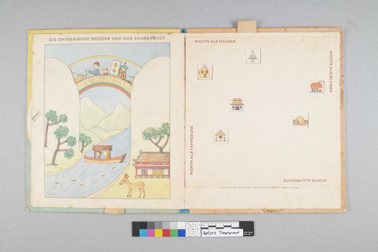opening of a book with colorful drawings featuring a scene of a mountain bridge over a river on the left and small drawings of homes on the right