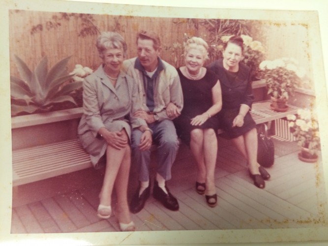 Photograph of four people