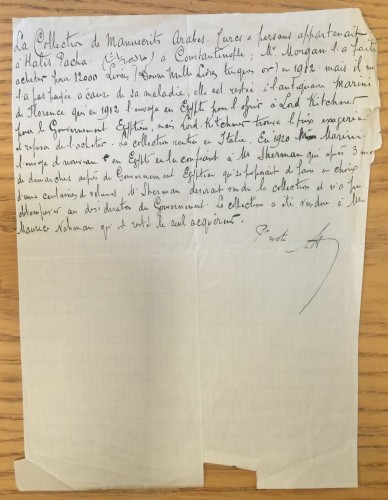 Handwritten note in black ink on ledger paper