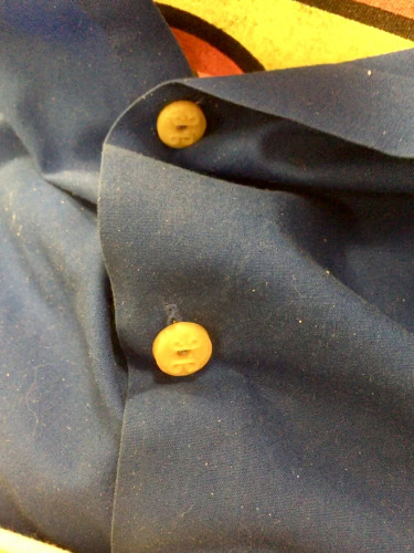 Close up image of 3D printed button caps on metal pins