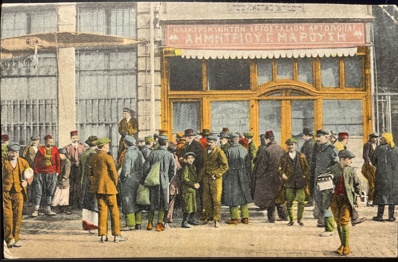 Postcard depicting a group of men in front of a two-store building in Salonica (Thessaloniki), circa 1917