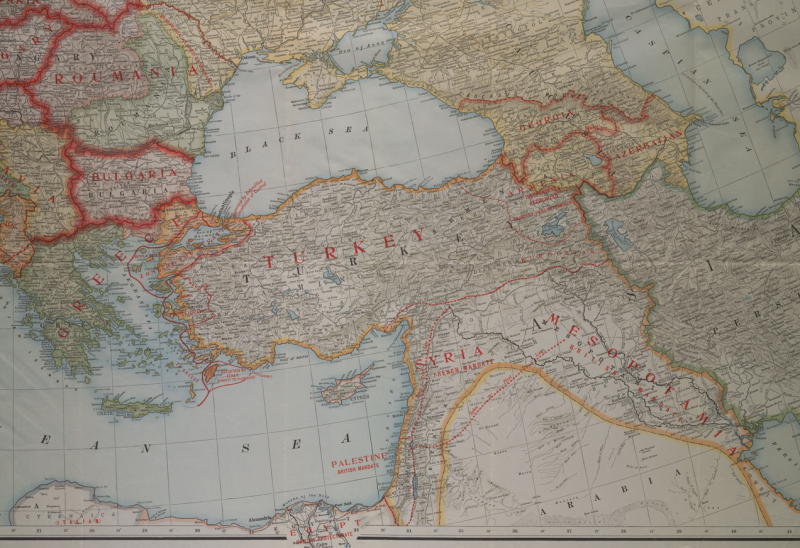  This map depicts the territorial changes of the Ottoman Empire following World War I, and has significant topographical detail. The map has Greece on the left in green, Turkey in the center in orange, and Iran on the right in green. Below Turkey are the British and French mandates of Syria and Mesopotamia (which is modern day Iraq) respectively. Above Turkey is the Black Sea and Crimea, and the Caucasus mountains. Territorial changes are delineated with red lines, such as in Western Anatolia. From top to 