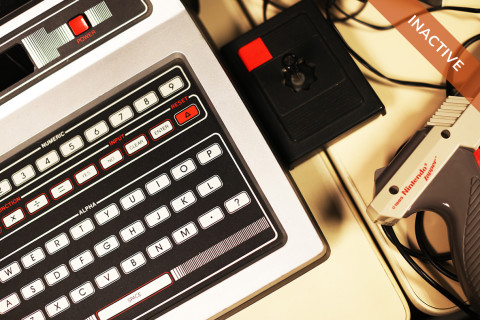 Aerial view of an old video game console with an "Inactive" banner in the corner.
