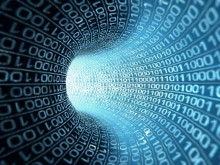 An image of a pipeline constructed of the numbers 0 and 1 going into the distance, with a bright light shining from the end of this virtual tunnel.