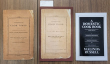 Three books in a row: a pale brown 19th c. booklet; a 21st century booklet with a picture of the first book on its cover, and a newly-published black and white paperback. 