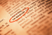 Photo from a dictionary, highlighting the word "research."