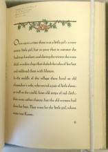 Opening page of the text of The Red Shoes by Hans Christian Andersen. 1928 Fine Press Edition with chapter heading of red shoes and leaves.