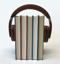 Headphones around five books