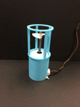 A light-blue 3D-printed thruster shroud