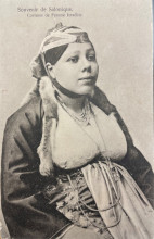 Woman in traditional dress, inscription in French