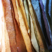 Dyed and burnished papers in a range of colors