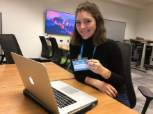 Holly siting at her computer in ScholarSpace