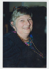smiling white woman with short gray hair