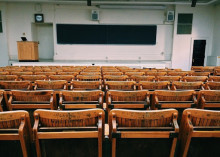 Photo of an empty lecture hall.