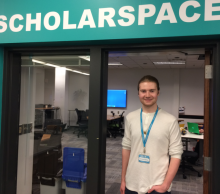 Mitchell Lawrence in doorway of ScholarSpace