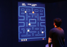 Person playing Pac-Man