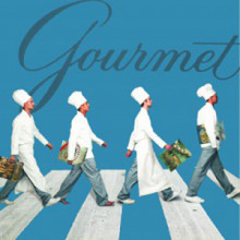Four chefs walking in a line.