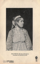 Woman in traditional dress, inscription in French